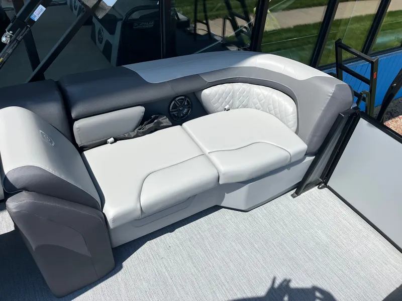 Slide: The Image of The image shows a luxurious, cushioned seat on a boat, featuring elegant gray and white upholstery. - 8