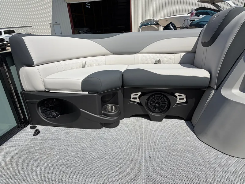 Slide: The Image of The 2026 Tahoe LTZ 2385 QL features a sleek, cushioned bench seat with built-in speakers. - 7