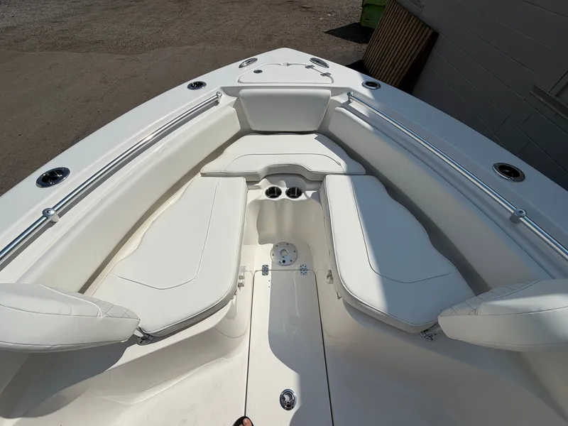 Slide: The Image of The 2027 Key West 239 FS features a spacious bow area with white cushions and cup holders. - 6
