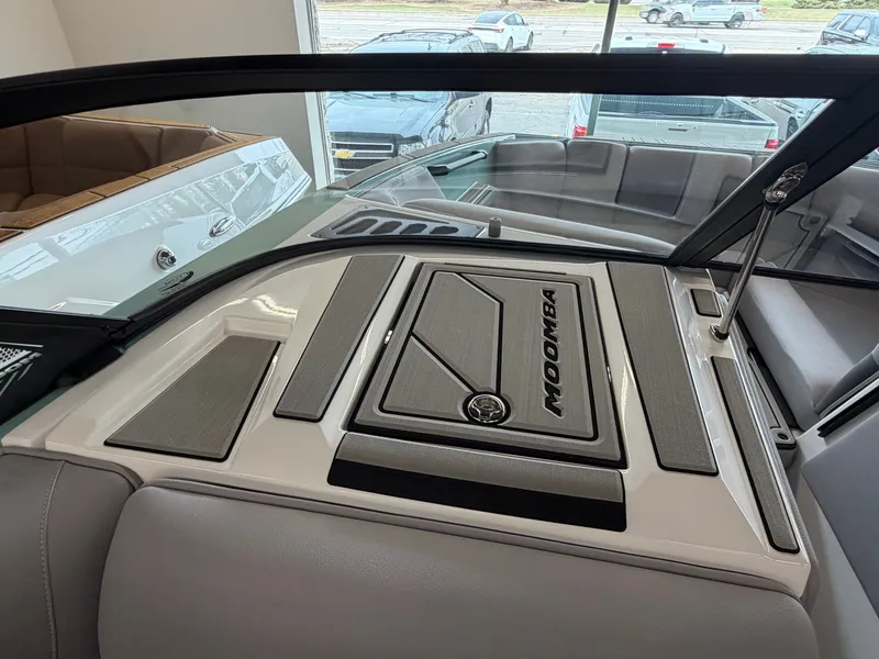 Slide: The Image of Interior view of a 2026 Moomba Tykon with gray upholstery and a stylish dashboard. - 16