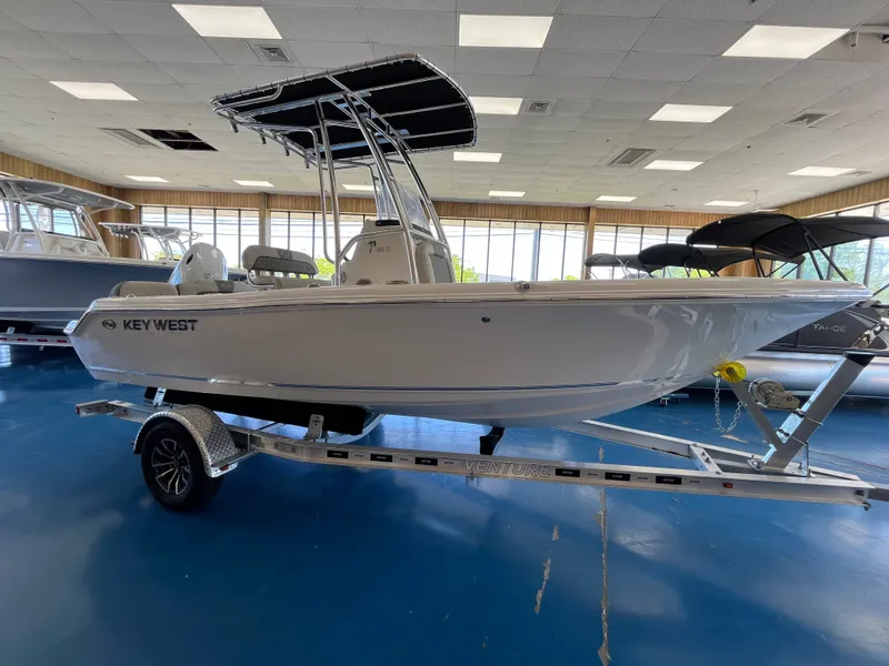 The Image of 2026 Key West 189 FS on a trailer in a showroom. - 0