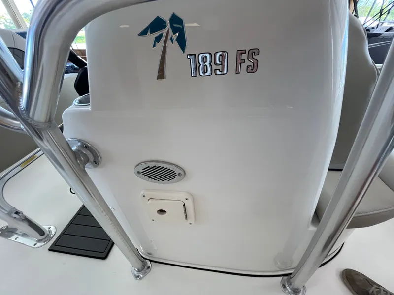 Slide: The Image of Close-up of a Key West 189 FS boat console with logo and speaker. - 8