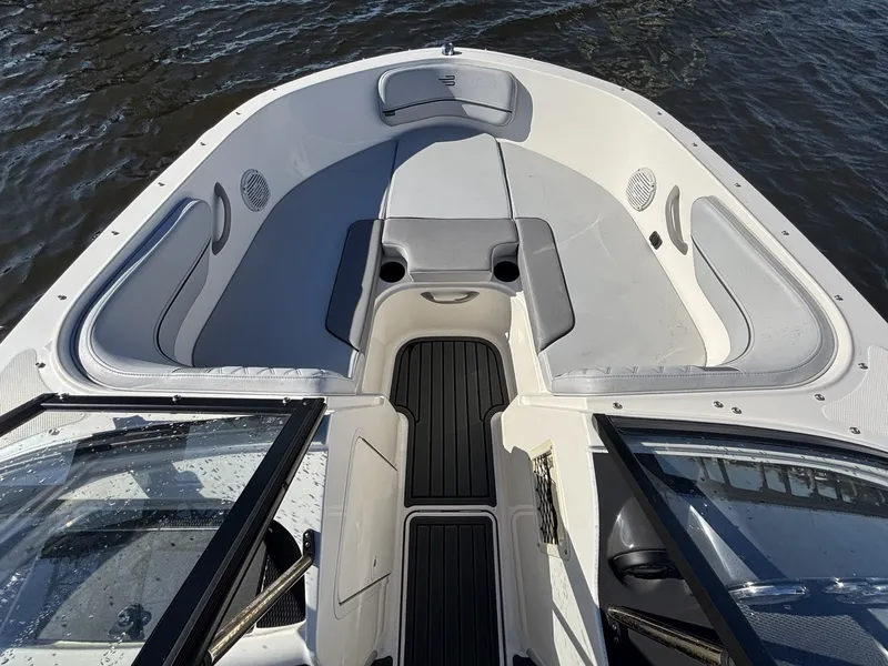 Slide: The Image of The image shows the bow area of a 2025 Bayliner VR4 Bowrider OB on the water. - 8