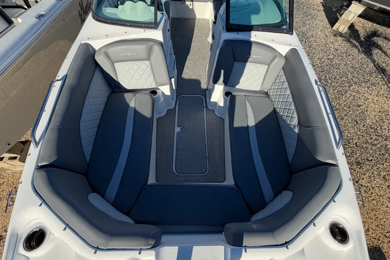 Slide: The Image of 2024 NauticStar 223 DC Deck boat interior with spacious seating and modern design. - 19