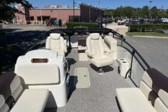 Slide: The Image of 2024 Palm Beach 23 HPT pontoon boat with spacious seating and modern design. - 3