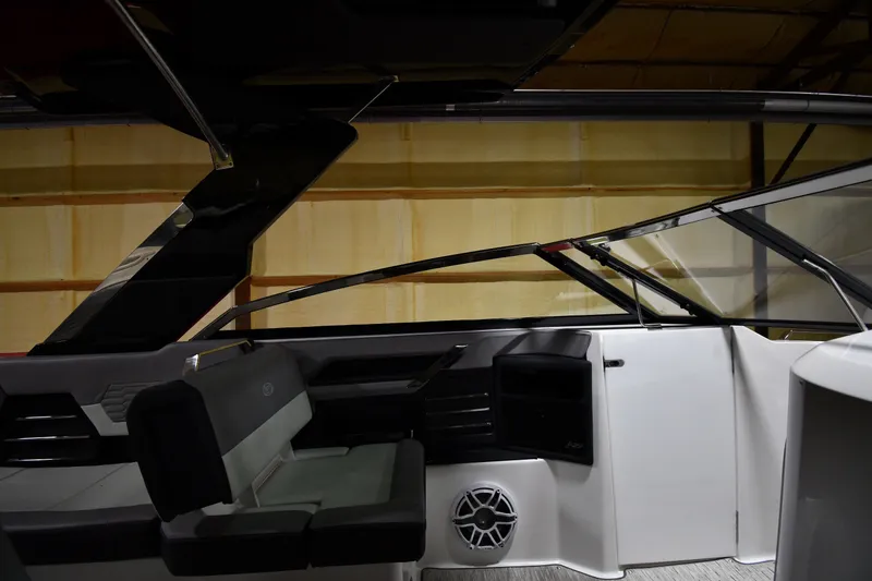 Slide: The Image of 2024 Cobalt A29 boat interior with sleek seating and modern design elements. - 14
