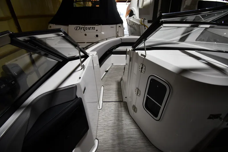Slide: The Image of 2024 Cobalt A29 boat interior with sleek design and modern features. - 22