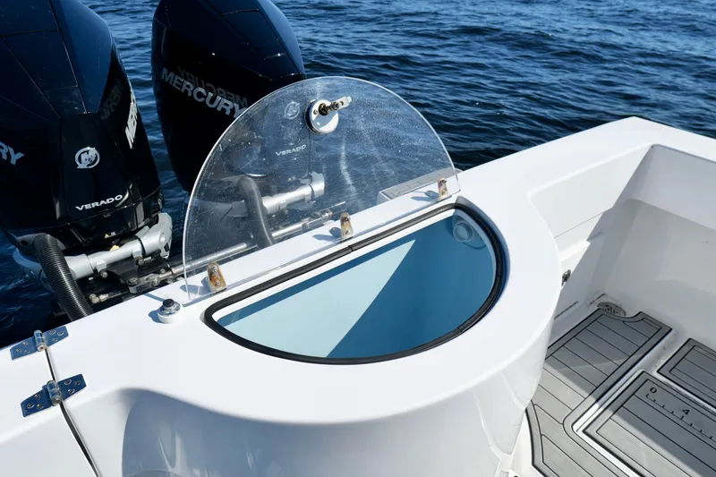 Slide: The Image of 2024 Onslow Bay 27 Offshore Edition boat with Mercury Verado engines on open water. - 28
