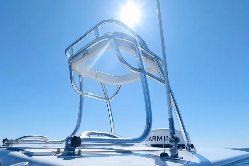 Slide: The Image of 2024 Onslow Bay 27 Offshore Edition boat tower under clear blue sky. - 42