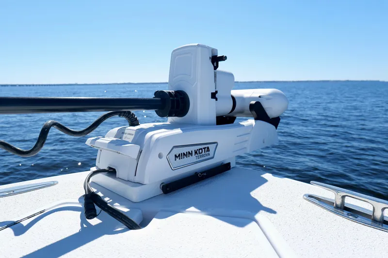 Slide: The Image of Minn Kota Terrova motor on 2024 Onslow Bay 27 Offshore Edition boat, ocean background. - 36