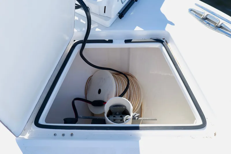 Slide: The Image of Open storage compartment on 2024 Onslow Bay 27 Offshore Edition boat. - 37
