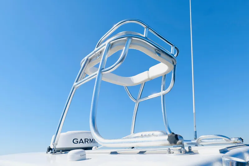 Slide: The Image of 2024 Onslow Bay 27 Offshore Edition boat tower against clear blue sky. - 41