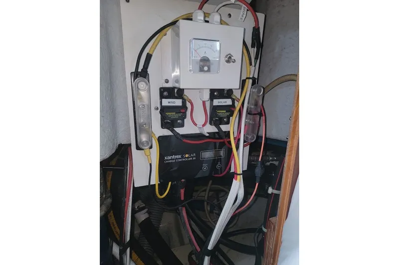 Slide: The Image of Electrical panel with Xantrex solar charge controller on 2001 Beneteau Oceanis Clipper 36 CC yacht. - 11