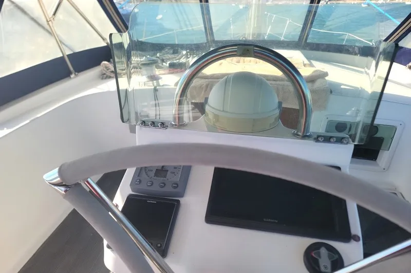 Slide: The Image of Cockpit view of 2001 Beneteau Oceanis Clipper 36 CC sailboat with navigation instruments. - 4