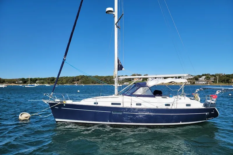 Slide: The Image of Sailboat on water, 2001 Beneteau Oceanis Clipper 36 CC, clear blue sky background. - 8