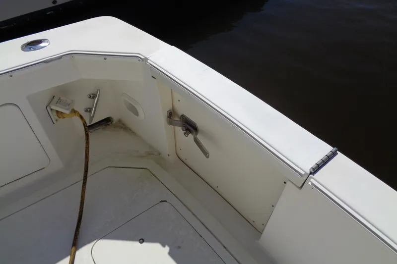 Slide: The Image of 1994 Bertram 30 Moppie boat deck corner with utility connections. - 11