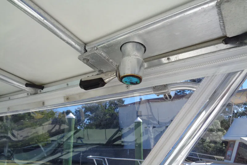 Slide: The Image of 1994 Bertram 30 Moppie boat interior detail with metal frame and handle. - 23