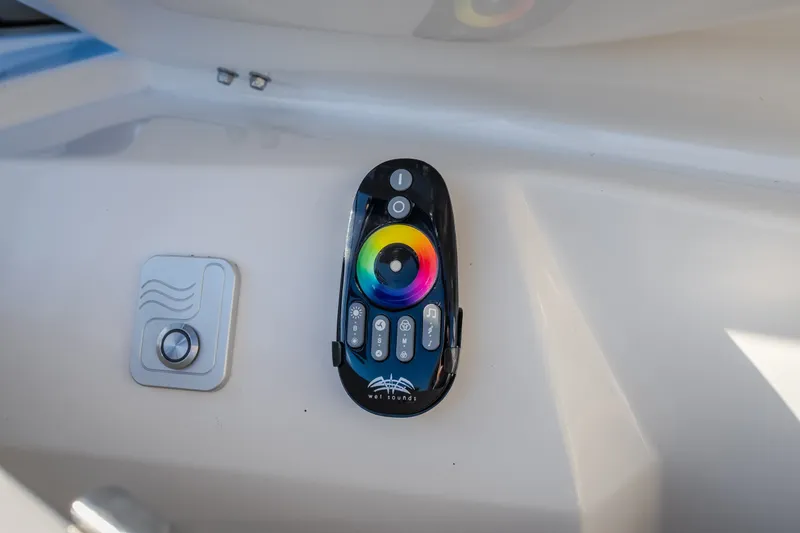 Slide: The Image of Control panel with colorful interface on 2018 Tigé RZX3 boat. - 26