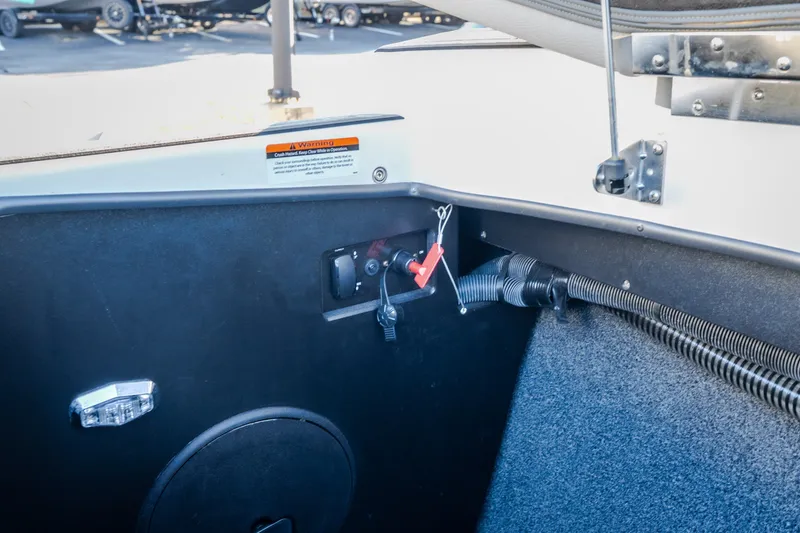 Slide: The Image of Interior view of a 2018 Tigé RZX3 boat, featuring control panel and wiring. - 43
