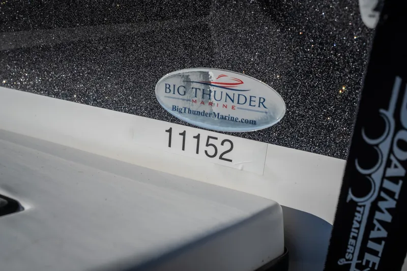 Slide: The Image of 2018 Tigé RZX3 boat with Big Thunder Marine sticker and number 11152. - 48