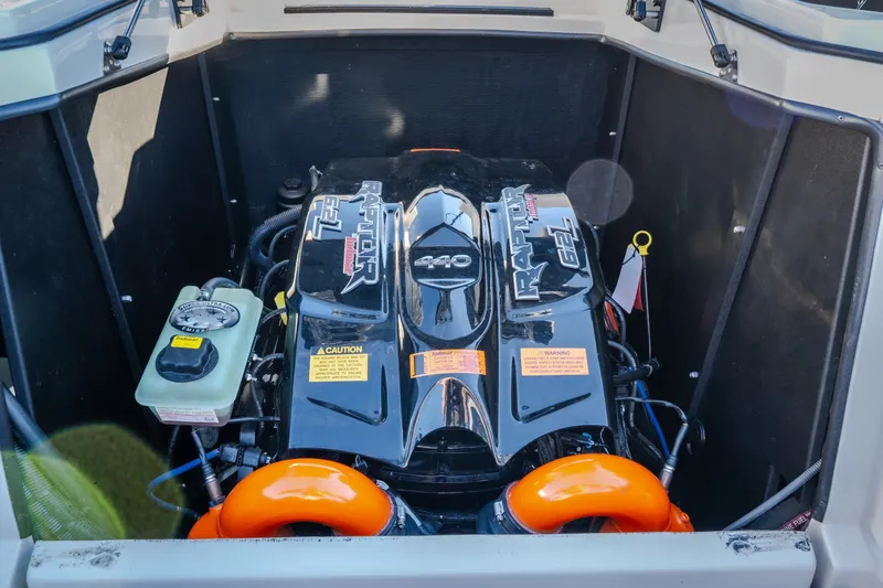 Slide: The Image of Engine compartment of 2018 Tigé RZX3 boat featuring Raptor 440 engine. - 45
