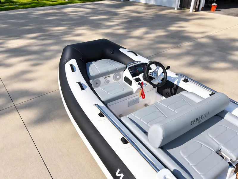 Slide: The Image of 2026 Williams Jet Tenders Sportjet 345 with sleek design and comfortable seating. - 13