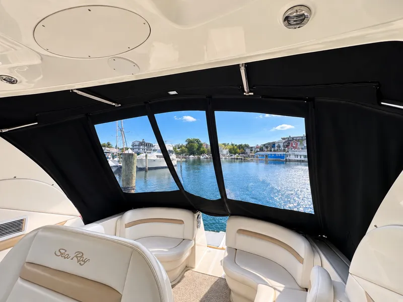 Slide: The Image of Interior view of a Sea Ray 390 Sundancer overlooking a harbor. - 14