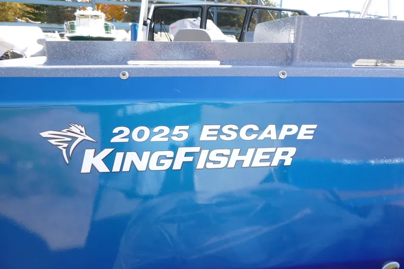 Slide: The Image of Blue KingFisher 2025 Escape boat with logo, model year 2027. - 26
