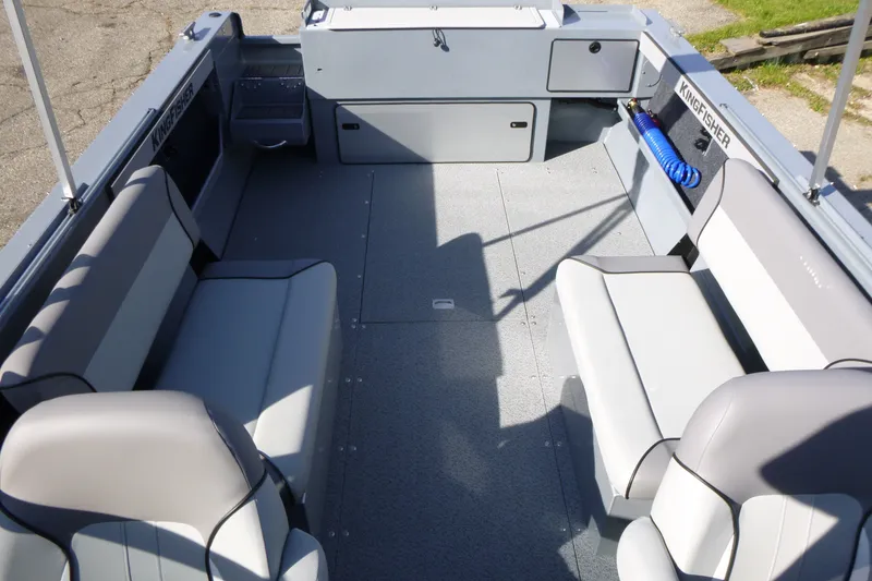 Slide: The Image of Interior of 2027 KingFisher 2025 Escape boat with spacious seating and modern design. - 16