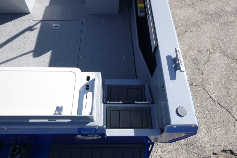 Slide: The Image of KingFisher 2025 Escape boat deck, featuring storage compartments and sleek design, 2027 model. - 10
