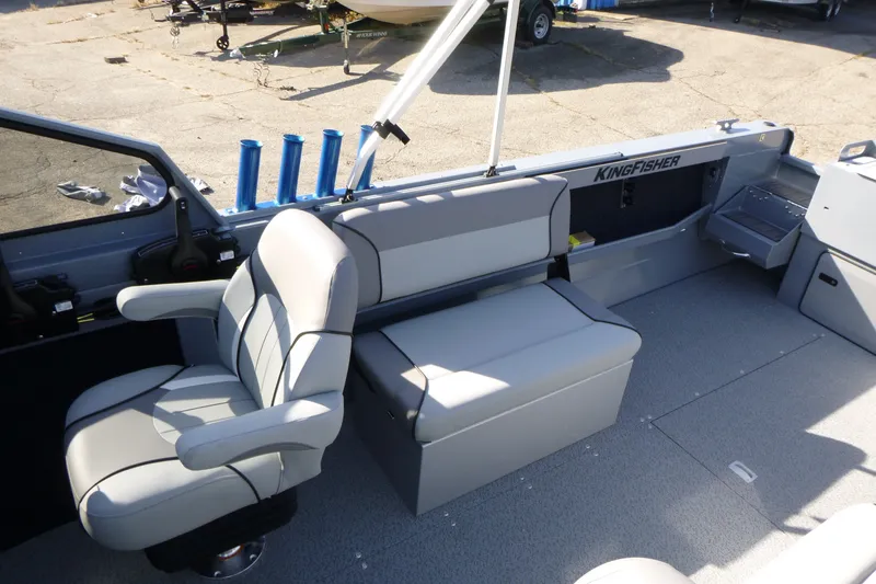 Slide: The Image of Interior of 2027 KingFisher 2025 Escape boat with seating and storage. - 17