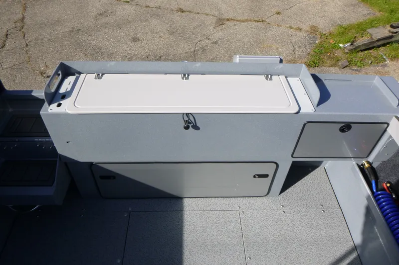 Slide: The Image of Interior of 2027 KingFisher 2025 Escape boat, featuring storage compartments and clean design. - 22