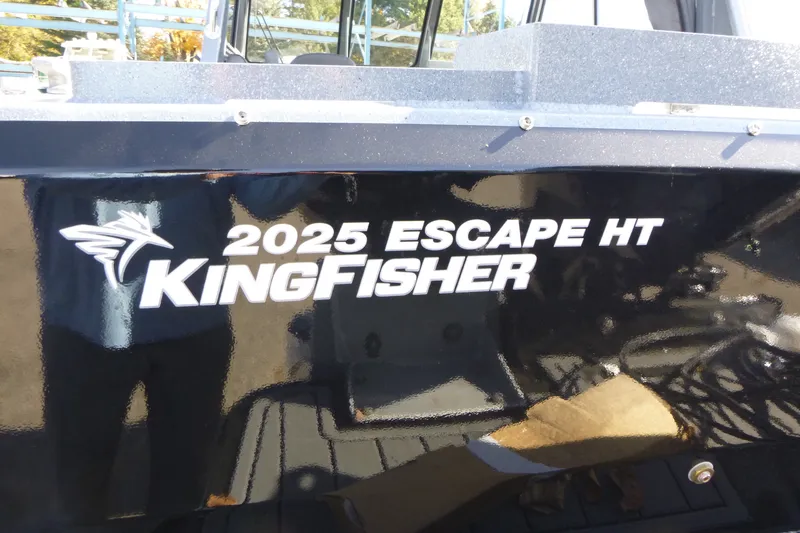 Slide: The Image of KingFisher 2025 Escape HT boat exterior with logo and model details. - 31