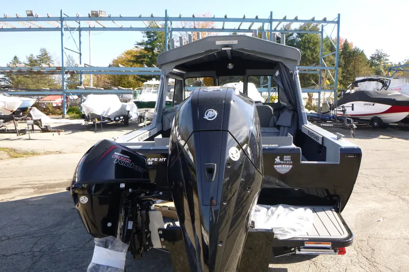 Slide: The Image of 2027 KingFisher 2025 Escape HT boat with powerful Mercury Pro Kicker engine. - 3