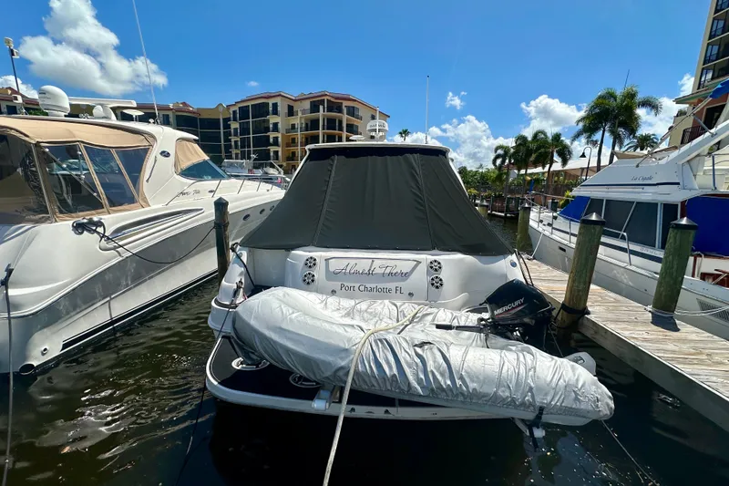Slide: The Image of 2001 Sea Ray Sundancer 460 docked in Port Charlotte marina, sunny day. - 3