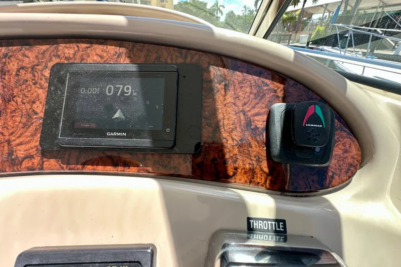 Slide: The Image of Dashboard of 2001 Sea Ray Sundancer 460 with Garmin navigation and Lewmar control. - 17