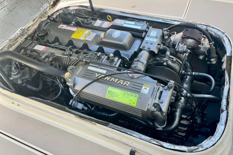 Slide: The Image of Engine compartment of a 2001 Albin 28 Tournament Express with Yanmar diesel engine. - 16