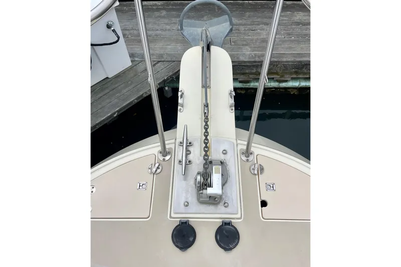 Slide: The Image of Bow of 2001 Albin 28 Tournament Express with anchor chain and deck fittings. - 13