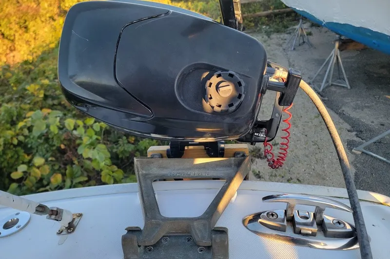 Slide: The Image of Close-up of a 2006 Ensign 23 Ensign #2015 boat motor and control panel. - 28