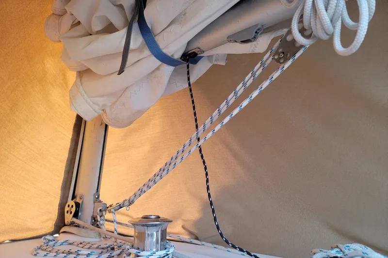 Slide: The Image of Close-up of 2006 Ensign 23 sailboat rigging and ropes. - 24