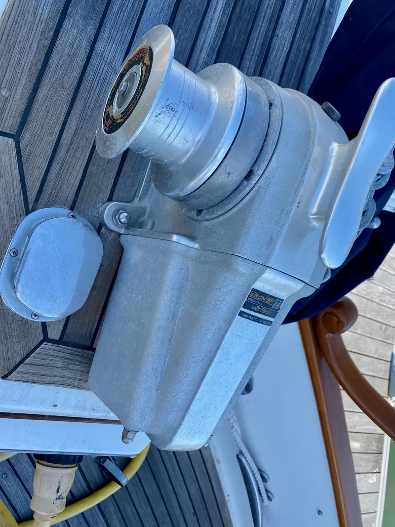 Slide: The Image of 1997 Grand Banks Classic boat winch on wooden deck. - 46