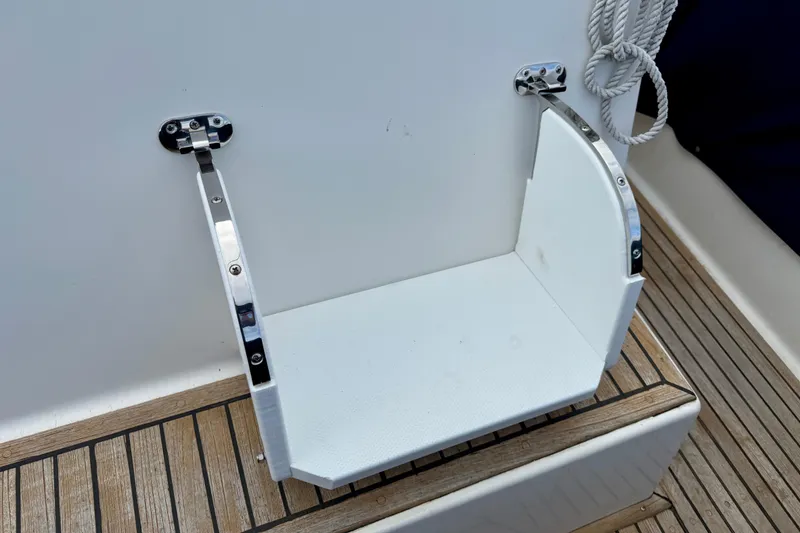 Slide: The Image of Foldable boat step on a 1997 Grand Banks Classic yacht deck. - 59