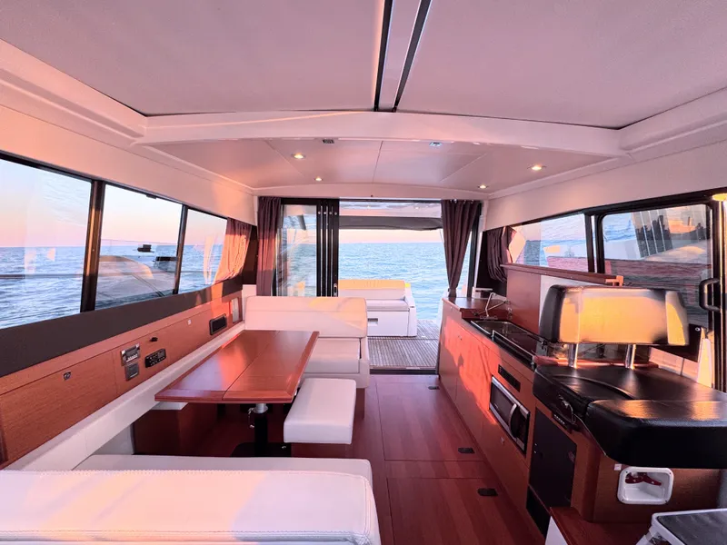 Slide: The Image of Interior of the 2017 Jeanneau NC 11 with modern design and sea view. - 29