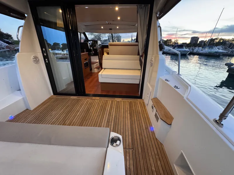 Slide: The Image of 2017 Jeanneau NC 11 with open cockpit and view into the interior. - 15