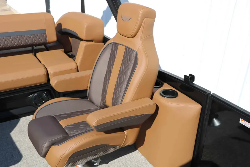 Slide: The Image of Luxurious captain's chair with brown leather and quilted details on a Bennington 22 MSB Tri Toon. - 44