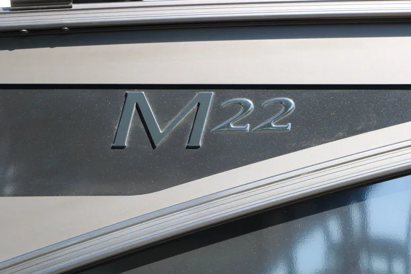 Slide: The Image of Close-up of the "M22" lettering on a boat. - 20
