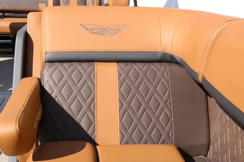 Slide: The Image of Close-up of a luxurious seat with quilted pattern and Bennington logo. - 34