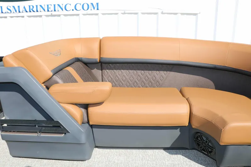 Slide: The Image of Luxurious upholstered seating in a modern boat with brown and gray design. - 33