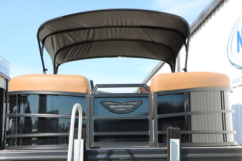 Slide: The Image of 2026 Bennington 22 MSB Tri Toon with a sunshade and sleek design features. - 9