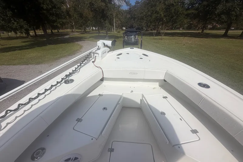 Slide: The Image of 2022 Pair Customs 21 Center Console DV boat with spacious seating and storage compartments. - 4